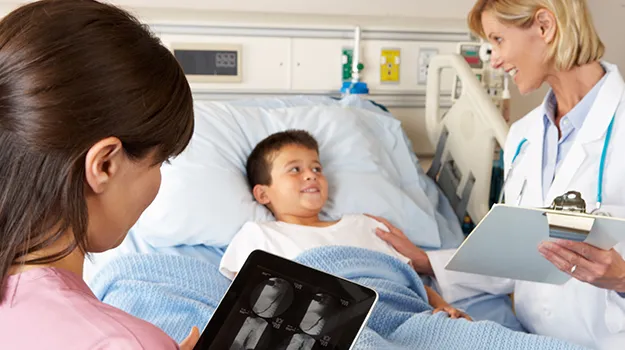 nurse using a digital notepad