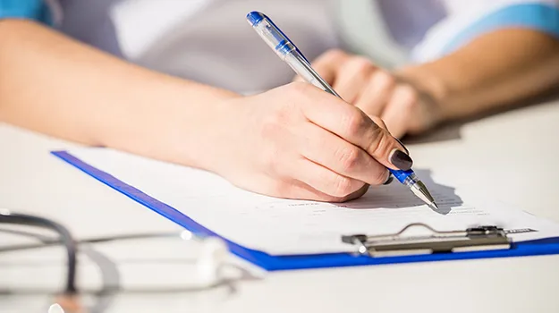 filling out patient form